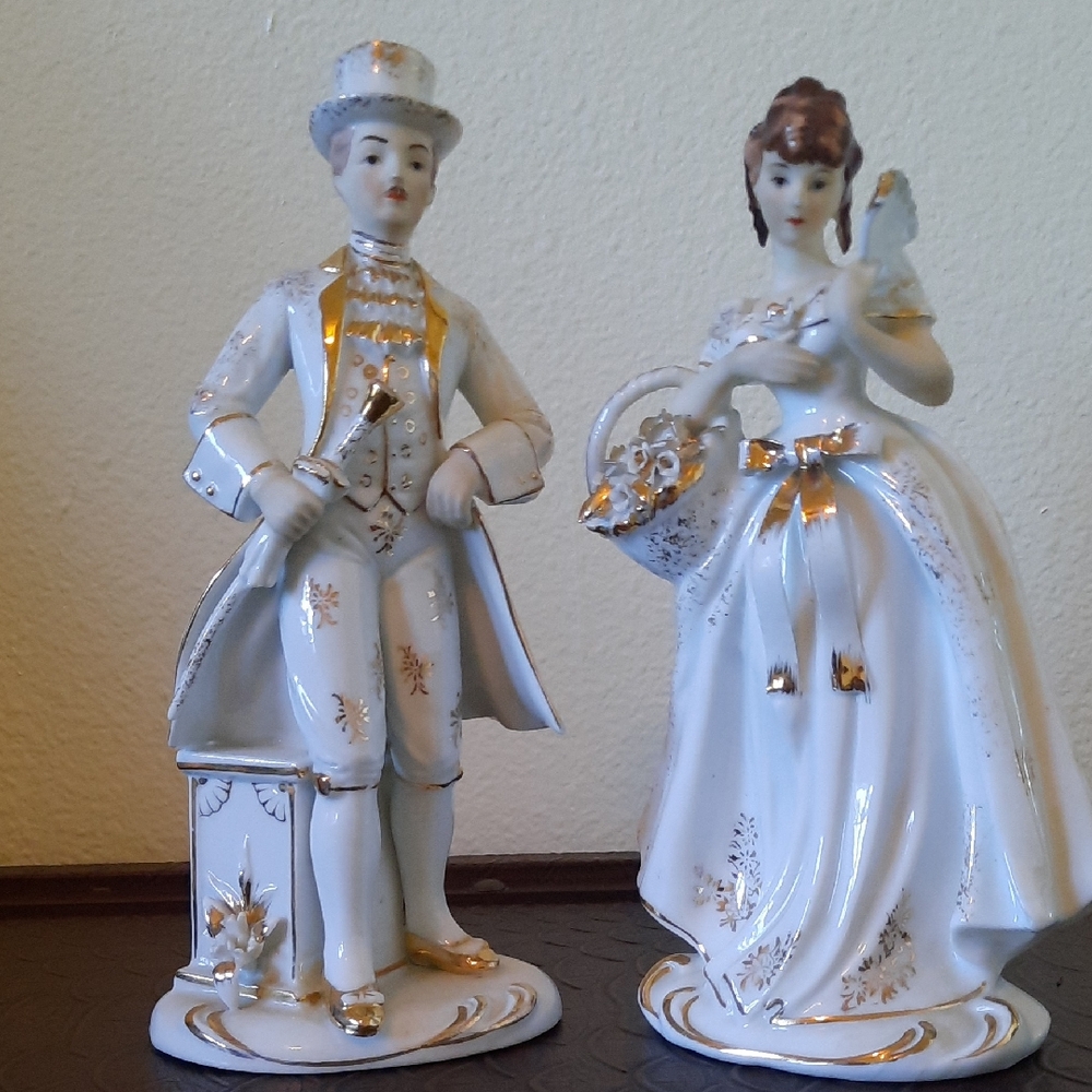 Elegant Porcelain Figurines with Gold Accents